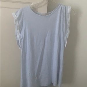 Short sleeved light blue/gray shirt